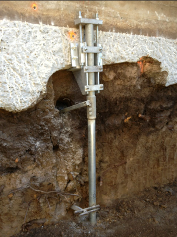 Pin pile shown in a soil cutaway